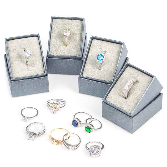 SALE PACK OF 24 Assorted CUBIC ZIRCONIA rings with FREE boxes.Only £2 each.