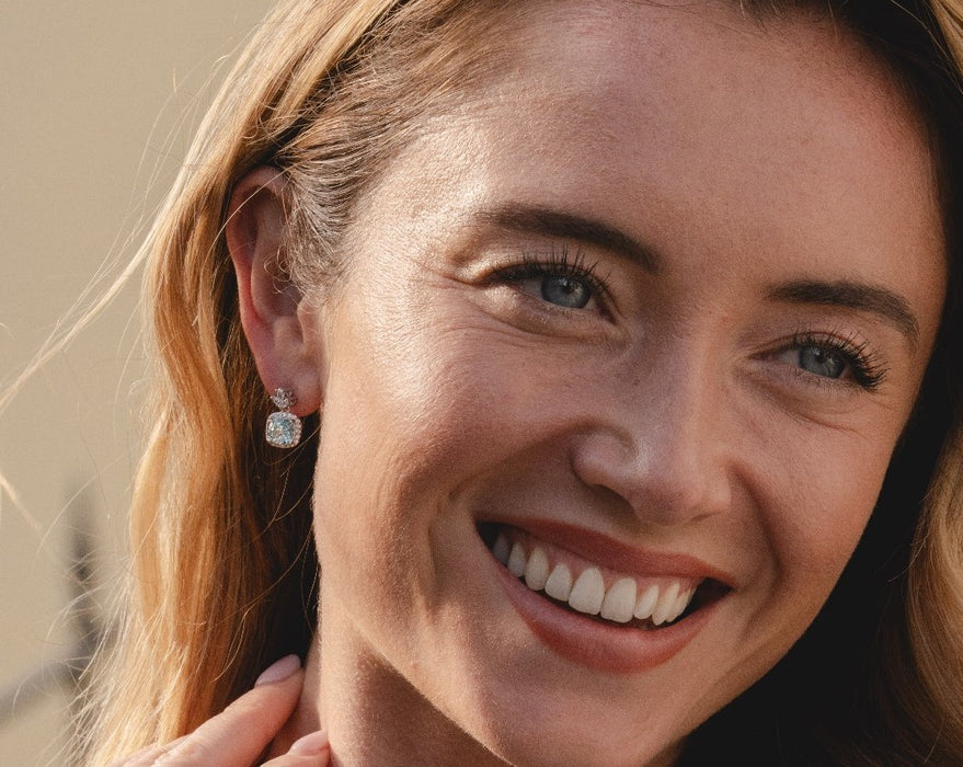 RHODIUM PLATED EARRINGS E2019 WITH CUBIC ZIRCONIA STONES. WITH A FREE GIFT BOX.